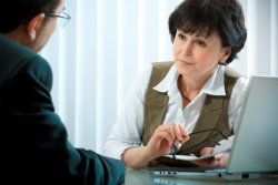 female therapist talking to her patient