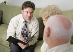 male psychiatrist listening to his patient's problem