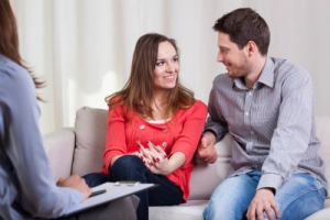 happy couple smiling after their therapy