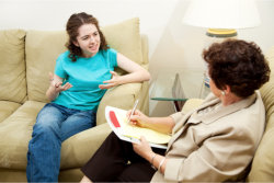 lady expressing frustration in a session with her therapist